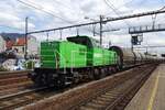 Railtraxx 6481 hauls a zinc ore train through Antwerpen-Berchem on 14 July 2022.