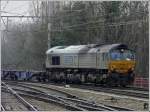 The DLC Railways DE 6301 is hauling a freight train through the station of Brugge on February 27th, 2009.