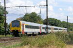 The NMBS 4113 and 2other DMU's coming from station Antwerpen-Berchem.