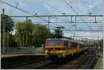 HLE 1182 with the IC Bruxelles Midi - Amsterdam CS is entering into the station of Roosendaal on September 5th, 2009.