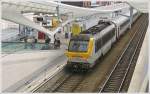 . HLE 1304 is pushing a ICa Oostende - Eupen out of the station Lige Guillemins on August 30th, 2009.