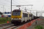 NMBS 1302 with sister speeds through Antwerpen-Luchtbal on 22 May 2014.
