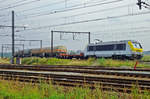 NMBS 1338 hauls a mixed freight through Ekeren on 30 May 2013.