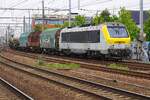 Lineas 1302 hauls a mixed freight through Antwerpen-Berchem on a grey 21 May 2026.