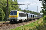 The Lineas 1343 with a VTG grain train to the port of Antwerp. NMBS serie 13 build in 2000 with construction N� 1363. NMBS Class 13: between 1997 and 2001  80 of these locomotives were build by Bombardier Brugge. Concept and parts from Alstom Belfort. Original NMBS numbers: 1301 to 1360, CFL numbers: 3001 to 3020. Max speed: 200km/h. Power: 5200kW. Power supply: 3000V and 25kV.  Numbers 1301 to 1345 are in service at Lineas, numbers 1346 to 1360 are in service at the NMBS. Line 27A at Antwerp Airport. 06-08-2026