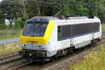 Lineas 1301 på väg mot hamnen i Antwerpen. Bombardier Brugge NMBS serie 13 byggd 1998 med konstruktionsnummer 1301. NMBS Klass 13: mellan 1997 och 2001 byggdes 80 av dessa lok av Bombardier Brugge. Koncept och delar från Alstom Belfort. Originalnummer NMBS: 1301 till 1360, CFL nummer: 3001 till 3020. Maxhastighet: 200 km/h. Effekt: 5200 kW. Strömförsörjning: 3000 V och 25 kV. Nummer 1301 till 1345 är i tjänst hos Lineas, nummer 1346 till 1360 är i tjänst hos NMBS. Linje 27A vid Antwerpen flygplats. 25-08-2026