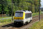 The NMBS 1351 on route to the service depot in the port of Antwerp. Bombardier Brugge NMBS serie 13 build in 2001 with construction N� 1371. NMBS Class 13: between 1997 and 2001  80 of these locomotives were build by Bombardier Brugge. Concept and pa ...