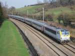 Multi-voltage engine HLE 1831 (EuroSprinter) hauling InterCity Eupen-Ostend past Baelen (20 March 2012)