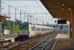 The HLE 1847 is pushing a IC A Oostende - Eupen out of the station Bruxelles Nord on June 23rd, 2012.