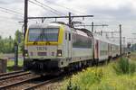 NMBS 1876 passes through Antwerpen-Noorderdokken on 19 May 2014.