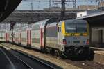 NMBS 1917 banks an IC service to Gent and Oostende out of Bruxelles-Midi on 10 June 2015.
