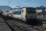 SNCB/NMBS 1826 banks an IC to Oostende via Brussel and Leuven into Li�ge-Guillemins on 21 May 2026.
