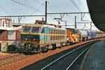 Mixed freight with NMBS 2004 passes through Antwerpen-Berchem on 18 May 2003.