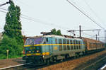 CargoWaggon train headed by 2015 passes through Antwerpen-Dam on 15 May 2002.