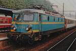 SNCB/NMBS  2204 stands in Liége-Guillemins on 17 July 1996 with an SNCF coach and adjacent to one of the last Breaks EMUs AM80 still to wear the red livery.