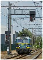 HLE 2364 is running through the station of Erquelinnes on June 23rd, 2012.