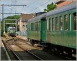 HLE 2364 taken together with the heritage wagons of the specail train  Adieu Srie 23  in Binche on June 23rd, 2012.