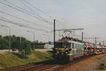 On 10 June 2006 NMBS 2324 hauls an automotive train through Antwerpen-Luchtbal toward Antwerpen's  massive port area.