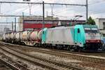 The intermodal Bertsch-shuttle train is hauled by 2827 through Antwerpen-Berchem on 29 June 2016.