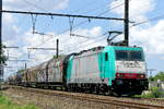 The BLS Cargo Nord E 186 232 coming from the port of Antwerp with a long mix train.