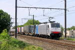 The Lineas 186 258 with a Hupac freight train from the port of Antwerp to Italy. Bombardier Traxx F140 MS build in 2016 with construction N� 35408. Line 27A at Antwerp Airport. 10-07-2026
