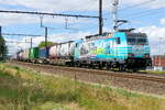 The Lineas 186 454  No Time To Waste  with a Hupac train from the port of Antwerp to Italy.