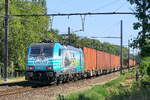 The Lineas 186 454  No Time to Waste  with a container train on route to the port of Antwerp.