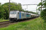 The Lineas 186 253 double traction with the 186 255 with a tank train on route to the port of Antwerp.