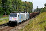 The Lineas 186 424 double traction for this long empty freight train to the port of Antwerp.