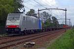 On 16 August 2019 Lineas 186 447 was still devoid of any markings whilst hauling a badly loaded container train through Hulten.