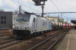 On 5 May 2023 Lineas 186 294 hauls a chemical train through Antwerpen-Berchem toward the port area.