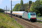 The RTB Cargo 186 233 with a gas tank train on route from the port of Antwerp to Germany. Bombardier Traxx F140 MS build in 2009 with construction N� 34482. Line 27A at Antwerp Airport. 01-09-2026