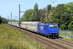 The BLS Cargo Nord 186 269 with a closed car train on route from the port of Antwerp.