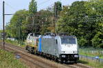The Lineas 186 289 towing the 7786 on route out of the port of Antwerp.  Bombardier Traxx F140 MS build in 2012 with construction N� 34841. Line 27A at Antwerp Airport. 15-09-2026