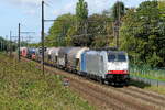 The Lineas 186 449 with a mixed train on route out of the port of Antwerp. Bombardier Traxx F140 MS2e build in 2017 with construction N� 35404. Line 27A at Antwerp Airport. 21-09-2026