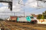 CoBRa (COoperation B-cargo RAilion) 2811 pulls its tank train through Antwerpen-Berchem on 10 September 2009. Photographers willing to take pictures of freight trains at Antwerpen Berchem are advised to take out their cameras now, since from 2014 almost all freights, that now pass through Berchem, will be directed into a new tunnel, skipping the roundabout route through Berchem.