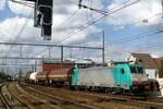 On 10 September 2009 CoBRa 2811 hauls an oil train through Antwerpen-Berchem.