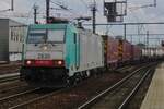 On a grey 3 September 2015 CoBRa 2830 hauls a container train through Antwerpen-Berchem. On a grey 3 September 2015 CoBRa 2830 hauls a container train through Antwerpen-Berchem.