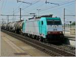 . The TRAXX HLE 2815 is hauling a freight train throug the station Antwerpen-Luchtbal on June 23rd, 2010.