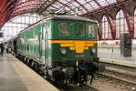 The NMBS 101.012 at Antwerpen Centraal for the celebration of 100 years NMBS. Type 101 the first electric locomotives of the NMBS. A total of 20 of these freight train locs were build in 1949 by Baume et Marpent SA. B'B , Max speed: 100km/h, Power: 1 ...