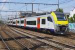 NMBS 81 591 passes empty stock through mAntwerpen-Berchem on 1 July 2026.