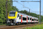 The NMBS 08061 on route from Antwerpen-Berchem to Lier station.