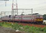 NMBS AM75  812 leaves Antwerpen-LUchtbal on 22 May 2014.