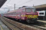 NMBS 810 stands at Antwerpen-Berchem on 29 June 2016.