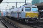 NMBS 832 calls at Antwerpen-Berchem on 24 June 2024.
