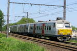 The NMBS 814 on route from Antwerpen-Berchem to Lier station. BN Brugge MS75 build in 1976. NMBS Class MS75 (MR75/EMU75) : Between 1975 and 1977 44 of these EMU (Electric Multi Unit) were build by BN Brugge. Numbers 801 to 844. Number of Carriages: 4 ...