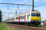 The NMBS 325 on route from Antwerpen-Berchem to Lier station. BN Brugge build in 1981, modernized in 2017. NMBS Class MS80-82 and 83 (MR80 / EMU80) : Between 1979 and 1985 140 of these EMU (Electric Multi Unit) were build by BN Brugge. Numbers: 301 t ...