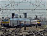 M 6 control car and AM 80 are leaving the station Bruxelles Midi together on May 30th, 2009.