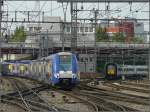 A French and a Belgian train are arriving in the same time in Luxembourg City on May 9th, 2009.