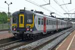 NMBS 973 speeds through Antwerpen Noorderdokken on a grey 22 August 2013.